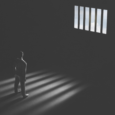 Businessman in jail cell