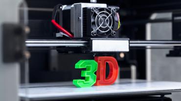 3D printer creating a "3" and "D"