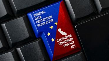 A custom computer key is split into two different colors: on the left side is the "General Data Protection Regulation" and "California Consumer Privacy Act"