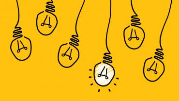Flat drawing of yellow lightbulbs hanging from wires, with one glowing white, in front of a yellow background.