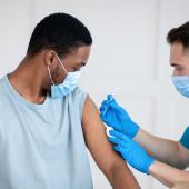 African American man receiving vaccine